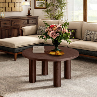 Modern Round Coffee Table with Solid Wood Legs – Stylish Centerpiece for Living Room with Neutral Tones and Elegant Floral Arrangement