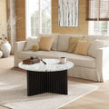 Modern Round Coffee Table with Ribbed Black Base – Minimalist Living Room Accent