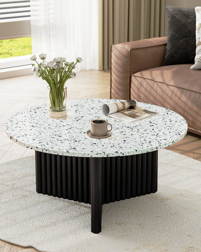 Modern Round Coffee Table with Ribbed Black Base – Minimalist Living Room Accent