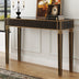 Mesa consola antigua con espejo y estructura de tono bronce